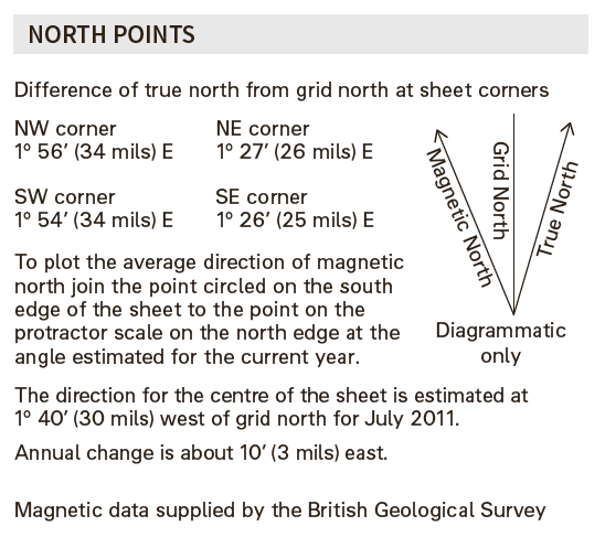 Section of the Ordnance Survey 1:25,000 Explorer map legend showing north points and notes on the difference between true north and grid north at sheet corners. Includes symbols for true north, grid north, and magnetic north, with explanatory text about angular variation between true and grid north